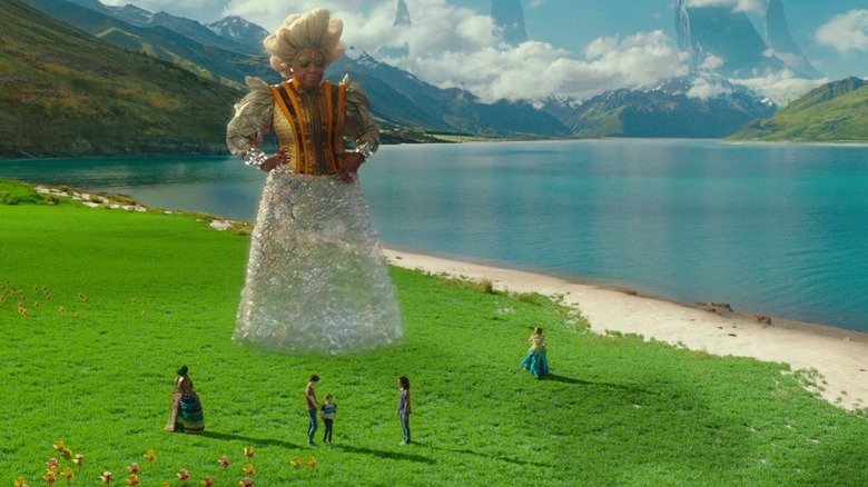 Giant Mrs. Which towering over group in A Wrinkle in Time