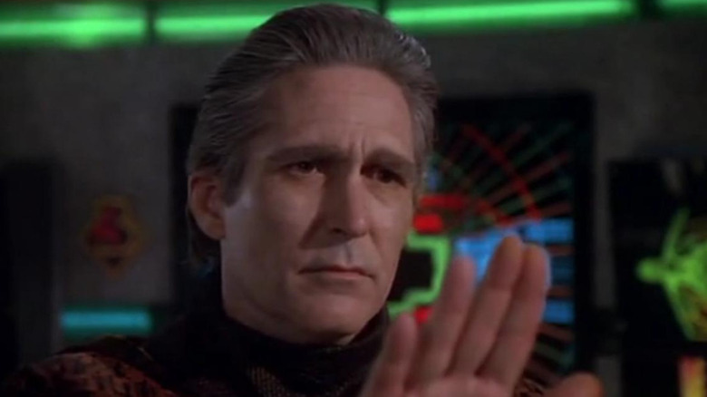 Babylon 5 Sinclair holds up his hand