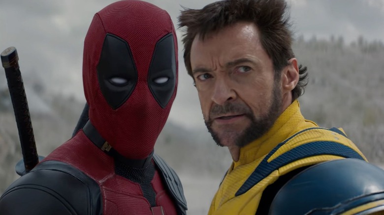 Deadpool & Wolverine stand close together in the Void