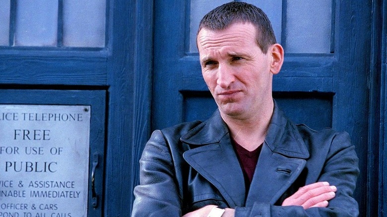 Doctor Who The Ninth Doctor stands outside the TARDIS