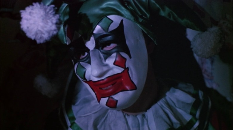 Eric the clown in his green-hatted suit in Sorority Row