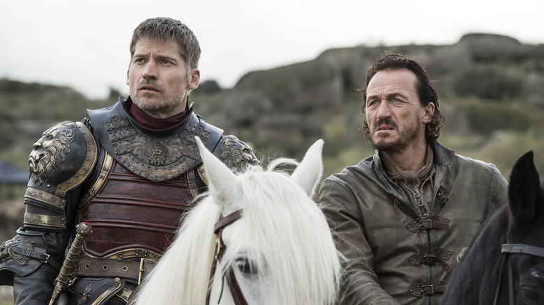 Jaime and Bronn concerned staring on horseback Game of Thrones