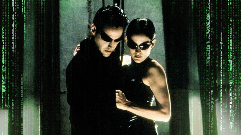 Keanu Reeves and Carrie-Anne Moss in The Matrix