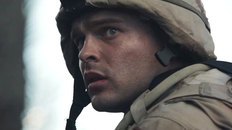 Alden Ehrenreich looking over his shoulder