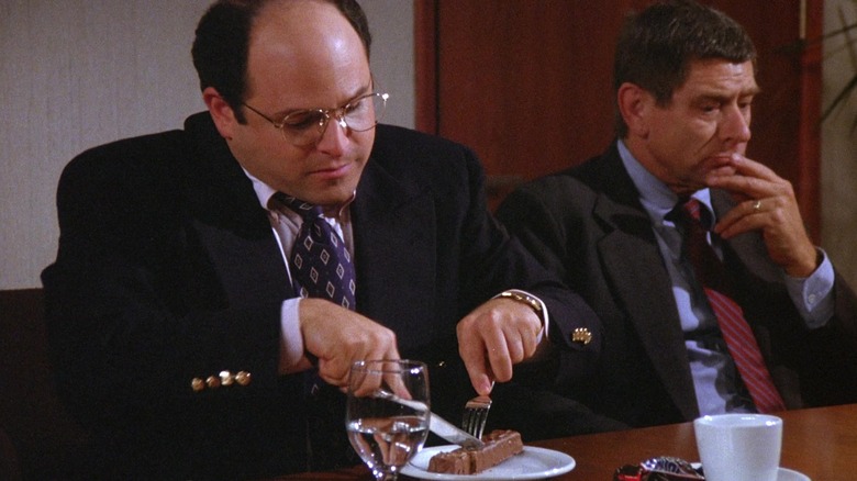 George Costanza cuts Snickers knife fork